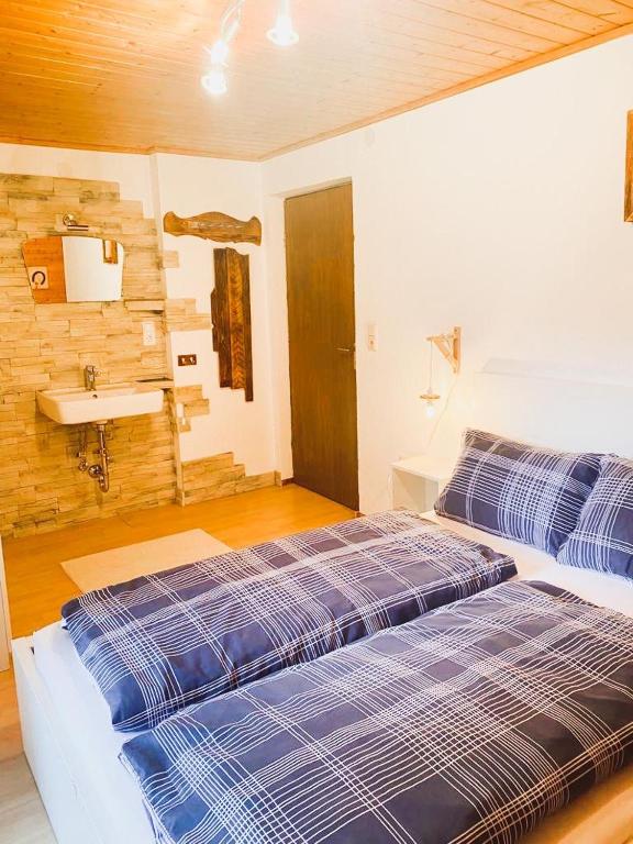 Postel nebo postele na pokoji v ubytování Ferienwohnung Steinberger