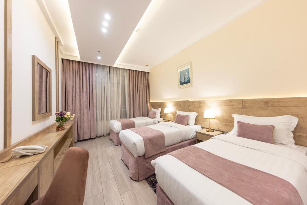 Postel nebo postele na pokoji v ubytování Hotel 21 Makkah