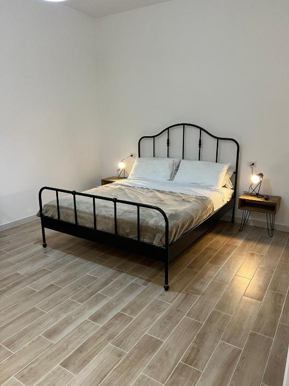 Postel nebo postele na pokoji v ubytování Le Tre Borghesi