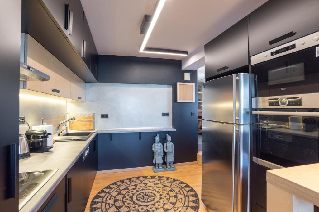 Kuchnia lub aneks kuchenny w obiekcie Athens Skyline Loft