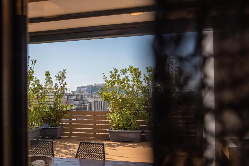 Balkon lub taras w obiekcie Athens Skyline Loft