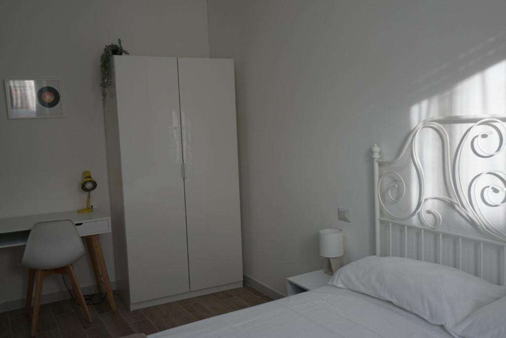 Postel nebo postele na pokoji v ubytování Le Tre Borghesi