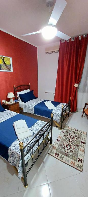 Postel nebo postele na pokoji v ubytování Casa da Maddalena e Andrea