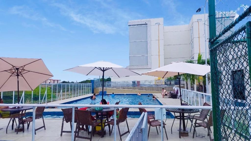 Πισίνα στο ή κοντά στο Lindo Apartamento em João pessoa com ar condicionado