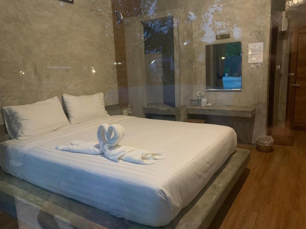 Postel nebo postele na pokoji v ubytování Alinda Resort