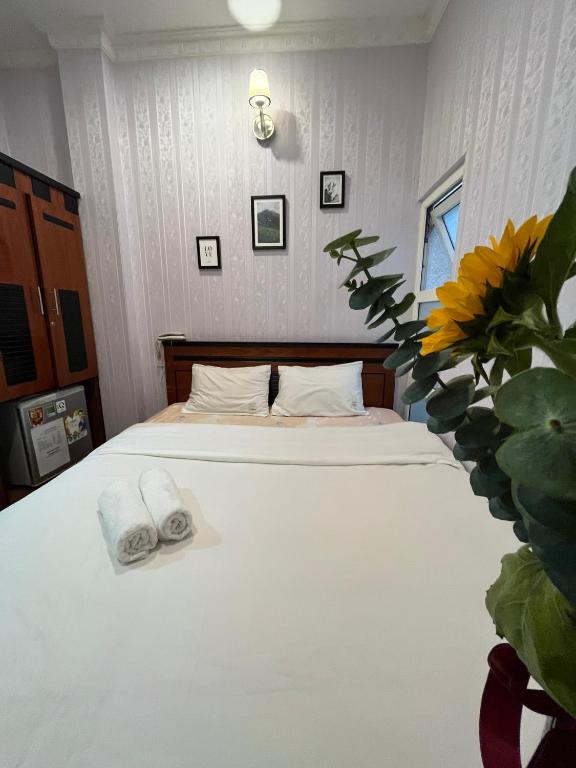 Postel nebo postele na pokoji v ubytování Dang Uyen 1 Hotel