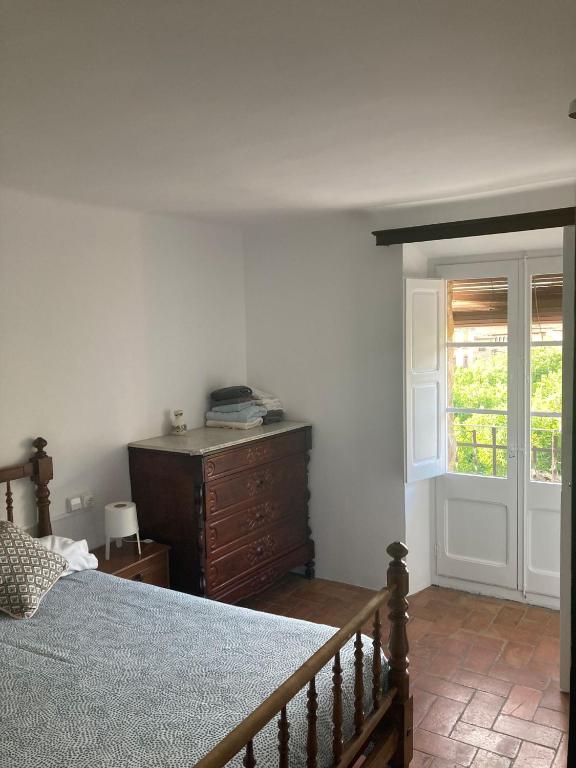 Postel nebo postele na pokoji v ubytování Ca l'Anyep - L'Ermita