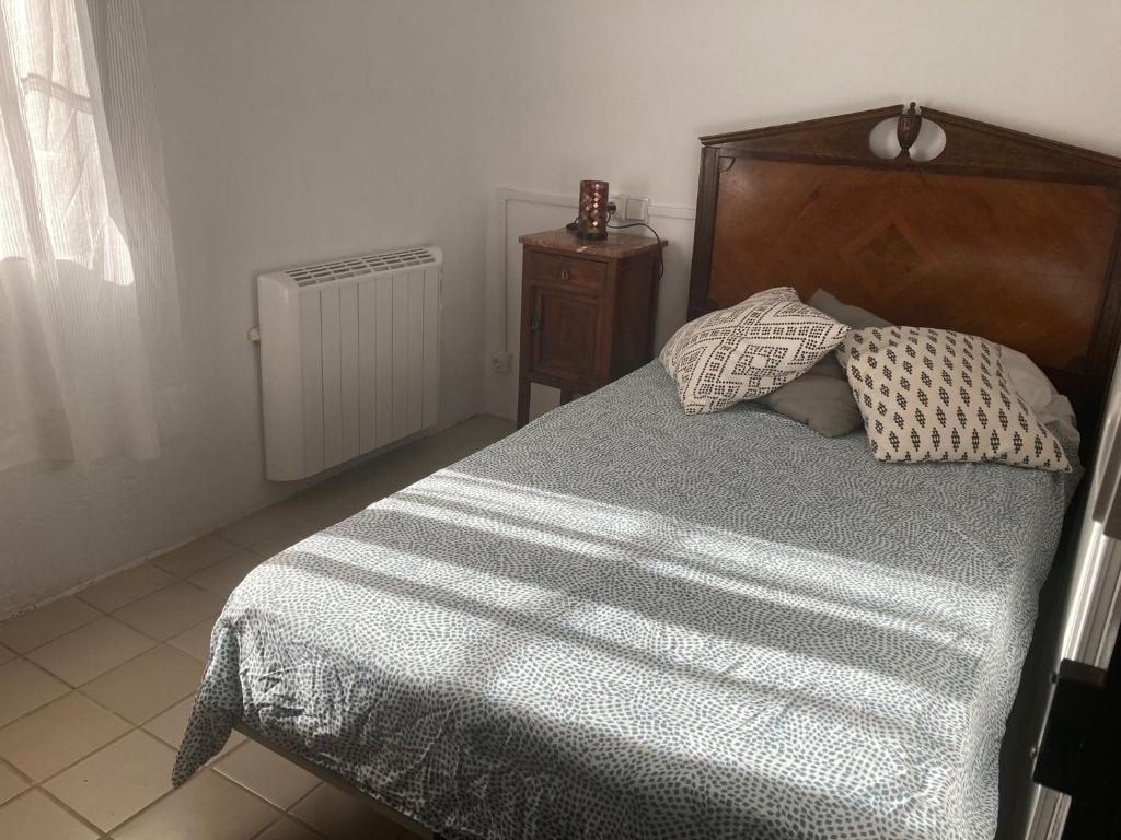 Postel nebo postele na pokoji v ubytování Ca l'Anyep - L'Ermita