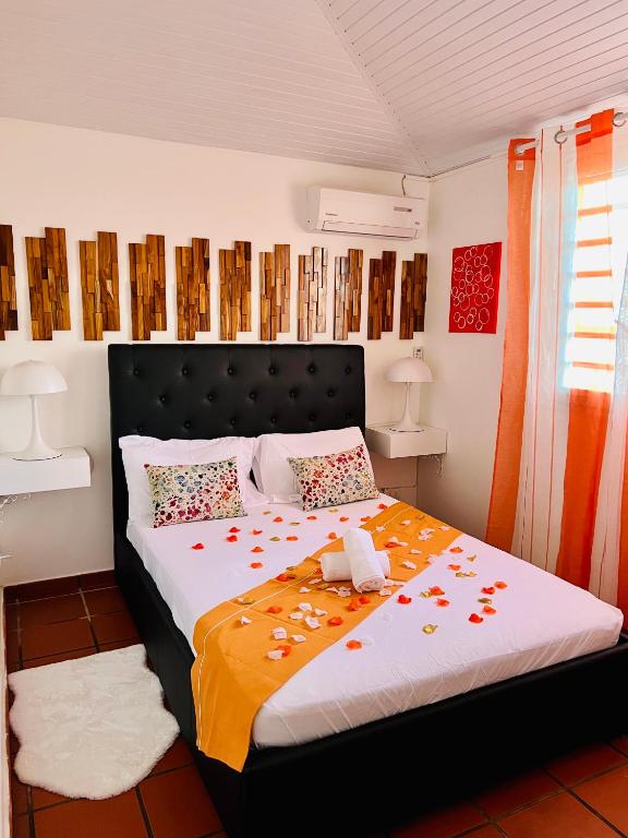 Postel nebo postele na pokoji v ubytování Villa Paradis