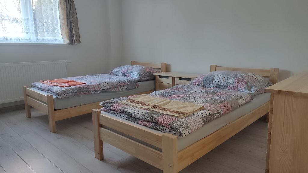 Postel nebo postele na pokoji v ubytování Privat Liska