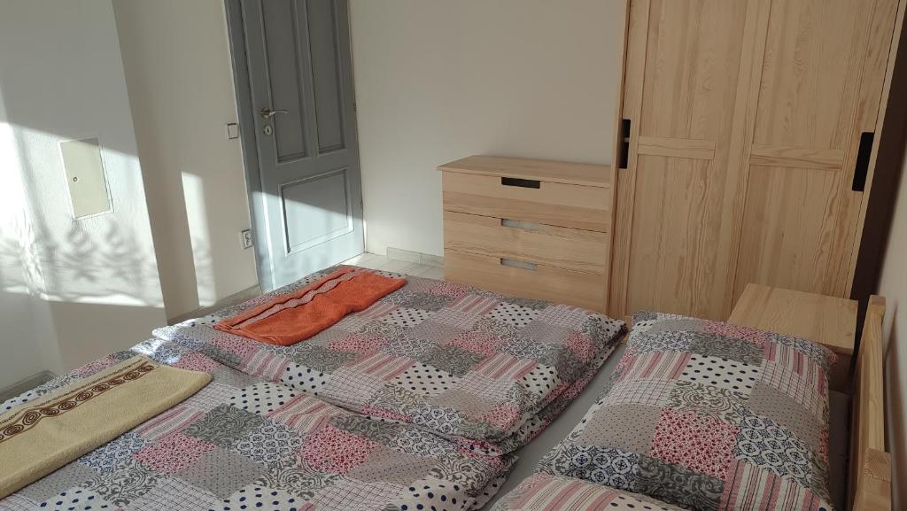 Postel nebo postele na pokoji v ubytování Privat Liska