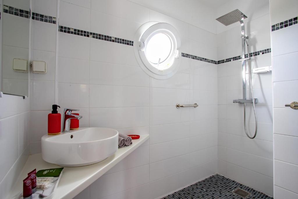 Koupelna v ubytování Hôtel Guadeloupe Palm Suites