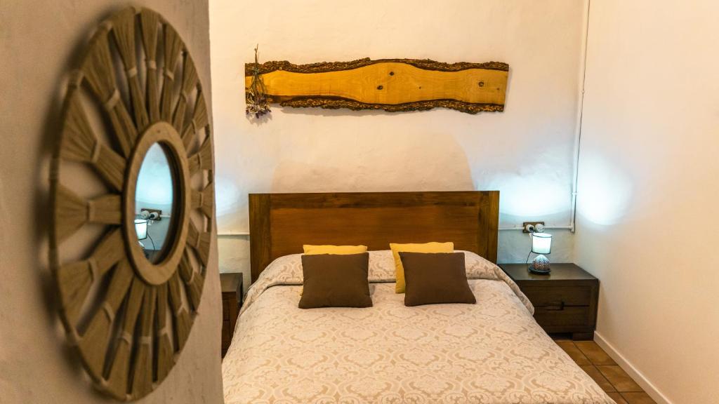 Posteľ alebo postele v izbe v ubytovaní Cal Belló Casa rural