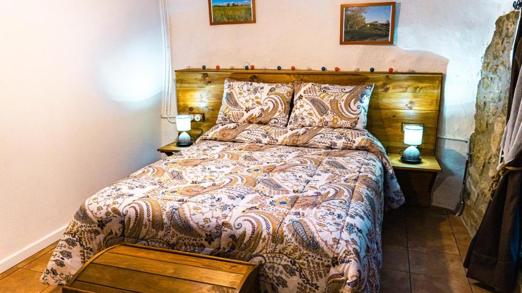 Posteľ alebo postele v izbe v ubytovaní Cal Belló Casa rural
