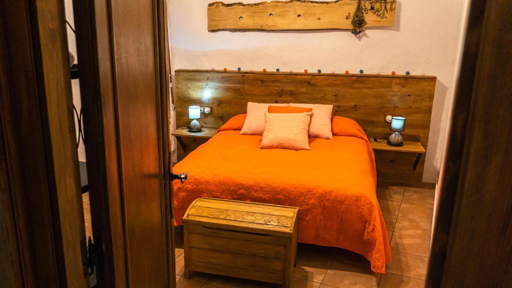 Posteľ alebo postele v izbe v ubytovaní Cal Belló Casa rural