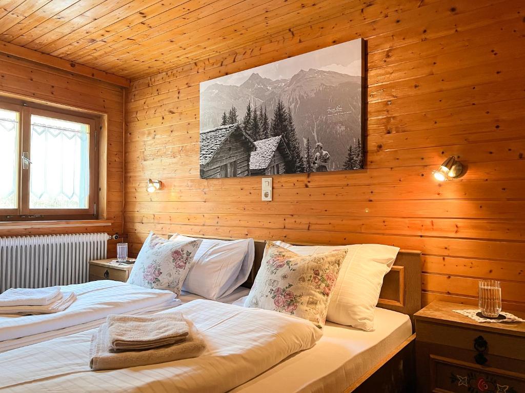 Postel nebo postele na pokoji v ubytování Spitzen Blicke – Apartments