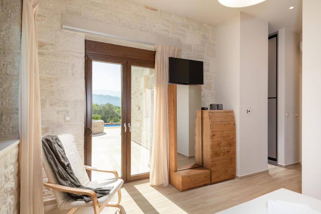 TV a/nebo společenská místnost v ubytování Montes Albi Villa - Your Familly Destination