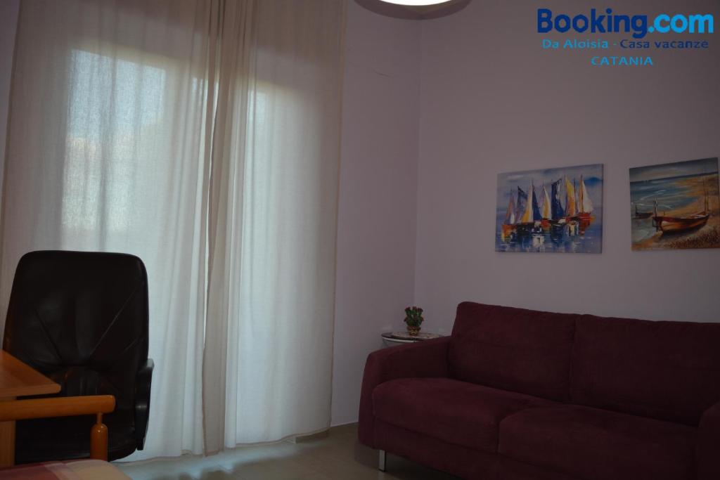 A seating area at Da Aloisia - Casa Vacanze