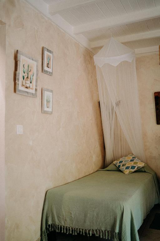 Postel nebo postele na pokoji v ubytování Caraib'Bay Hotel