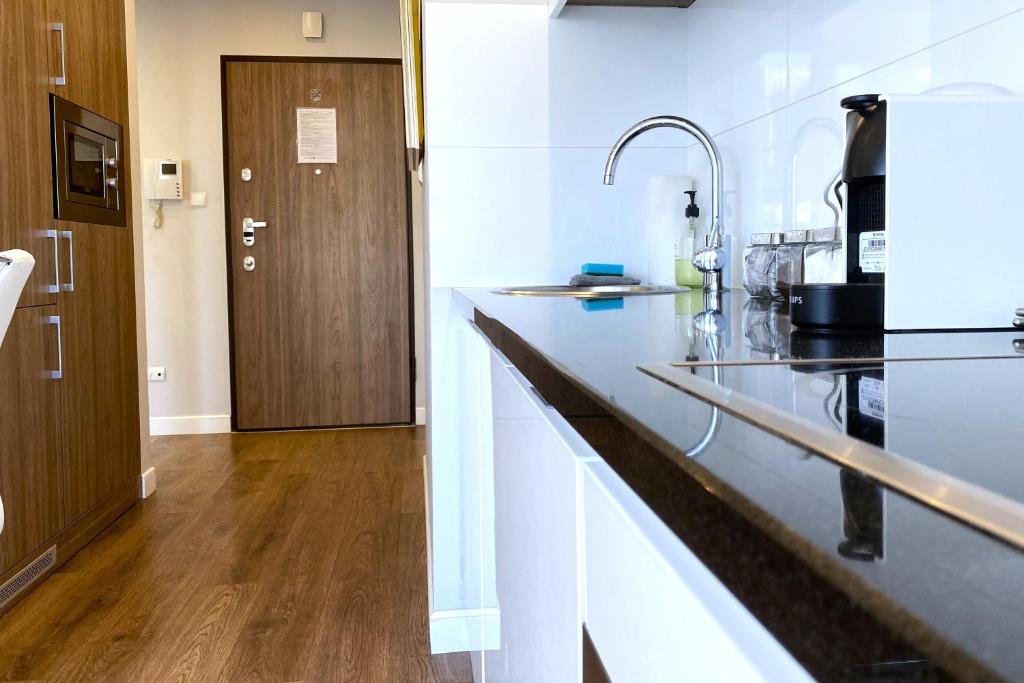 Kuchyňa alebo kuchynka v ubytovaní erApartments Oxygen Residence