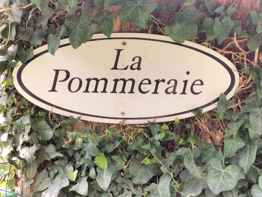 a sign that reads la pommercalde at Longère Bretagne in Réminiac