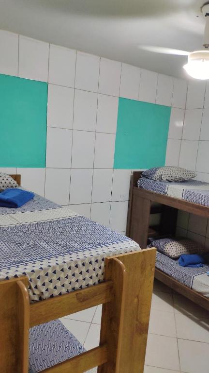 Postel nebo postele na pokoji v ubytování Hostel da Floresta