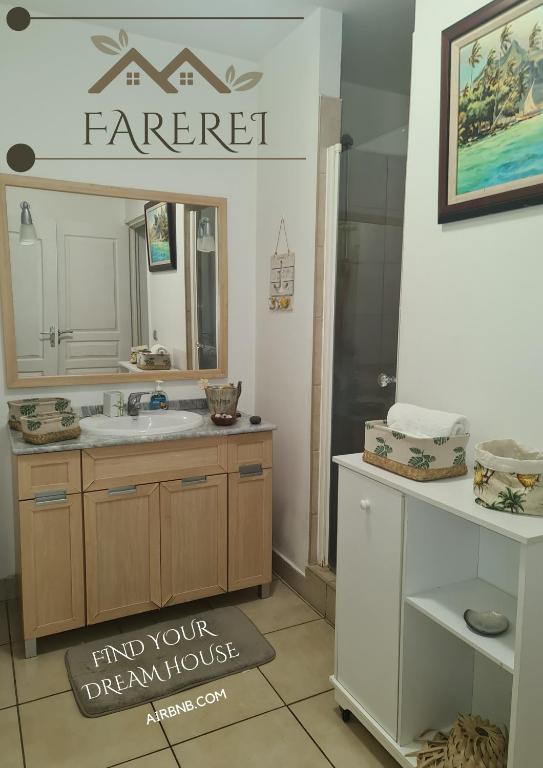 Kuchyň nebo kuchyňský kout v ubytování Farerei Appartement spacieux, équipé et confortable