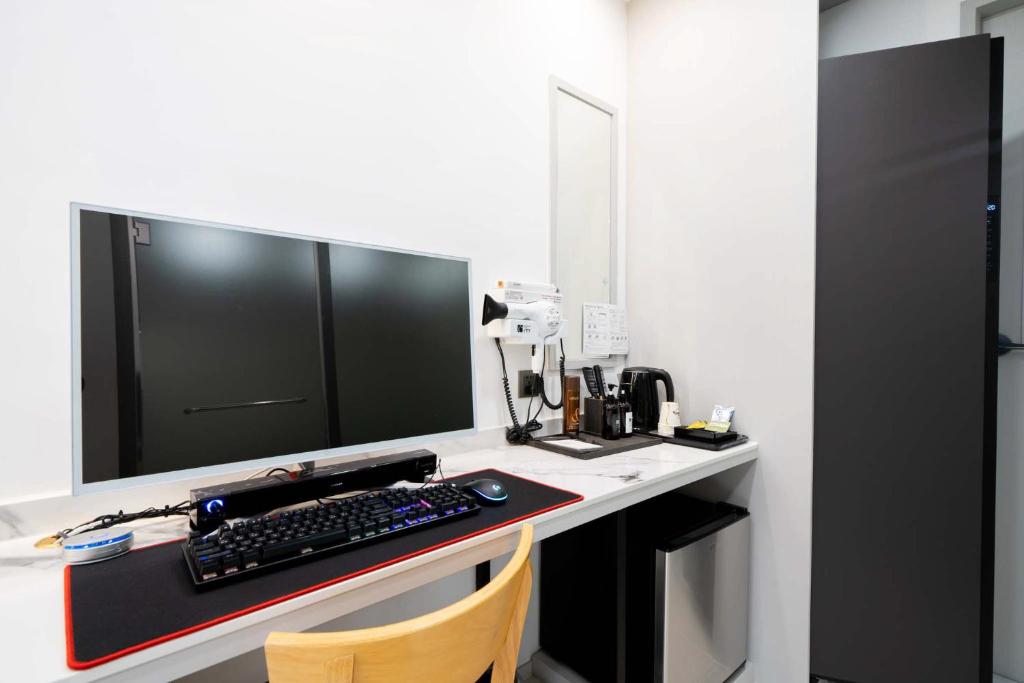 Kuchyň nebo kuchyňský kout v ubytování Ytt Hotel