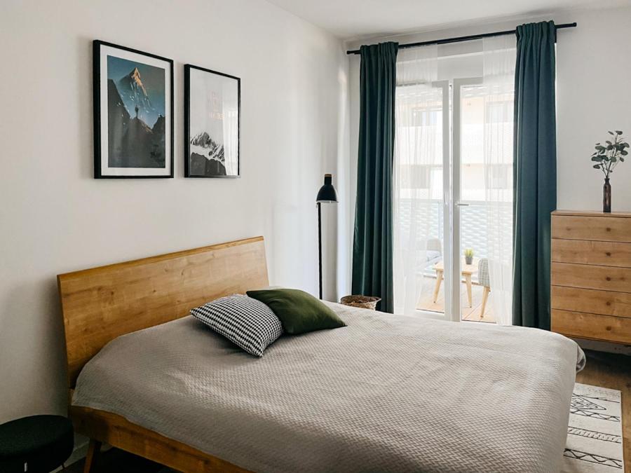 Posteľ alebo postele v izbe v ubytovaní Apartamenty City Tower od WroclawApartament-pl