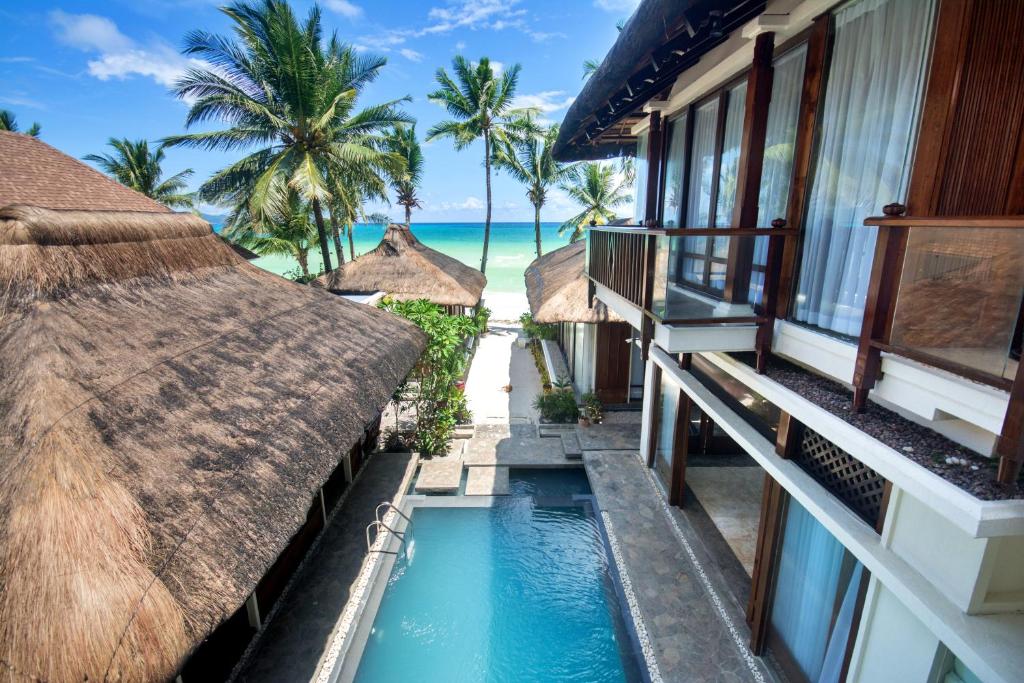 Πισίνα στο ή κοντά στο Harlan Beach Villa Boracay