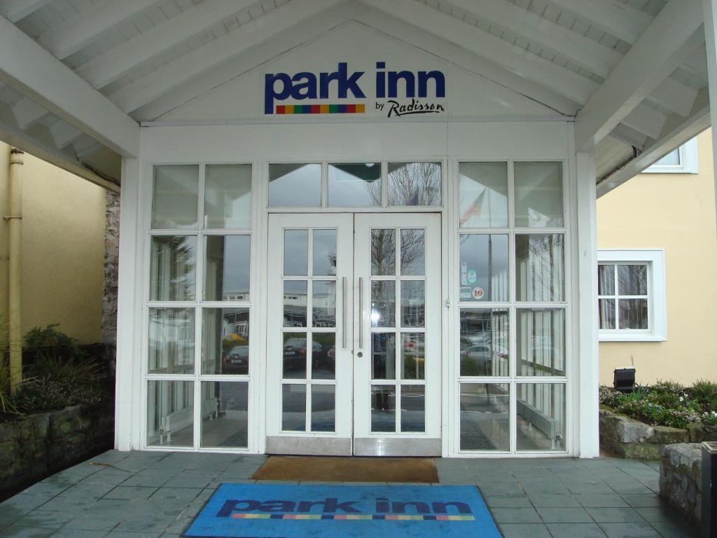 an entrance to a park inn building with a sign on it at Park Inn by Radisson Shannon Airport in Shannon