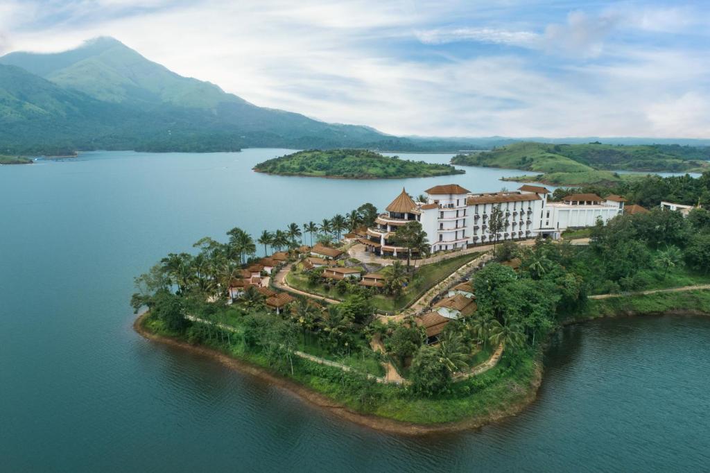 an island in the middle of a body of water at Taj Wayanad Resort & Spa, Kerala in Wayanad