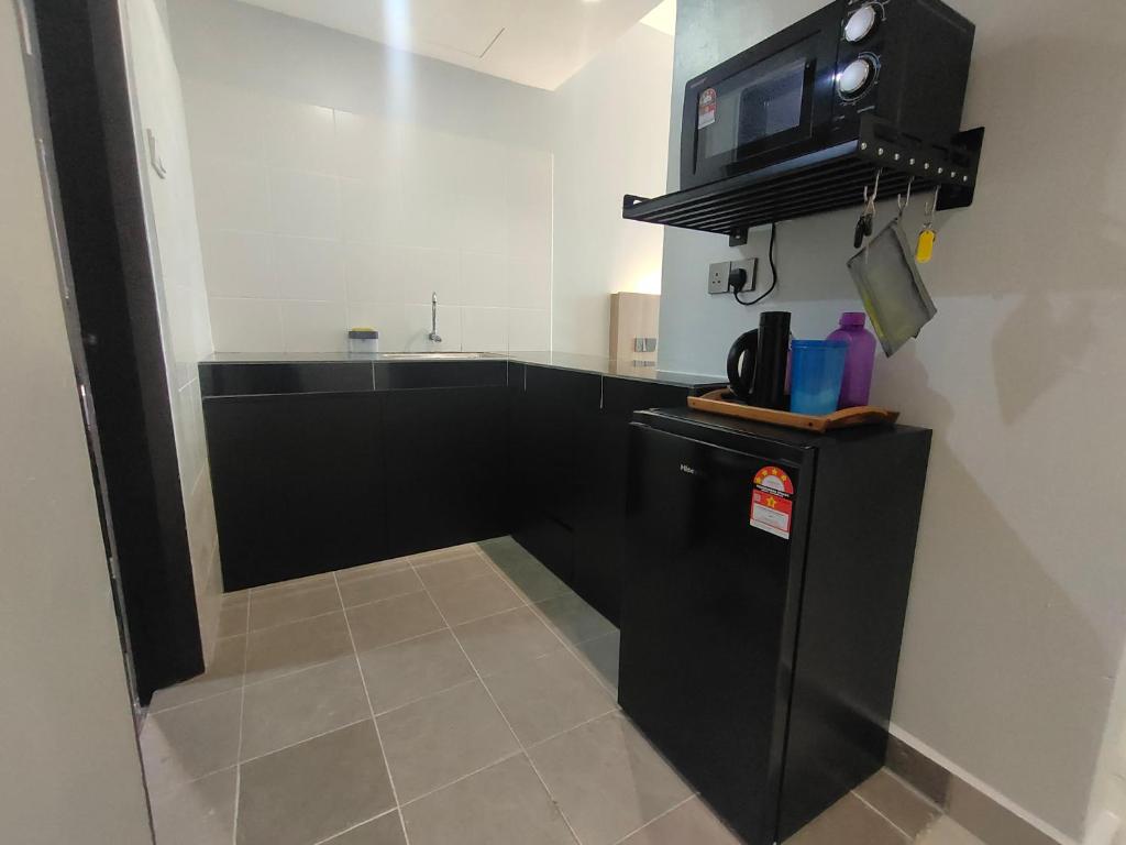 Kuchyň nebo kuchyňský kout v ubytování Alish Studio Apartment with Pool, Netflix, Wifi