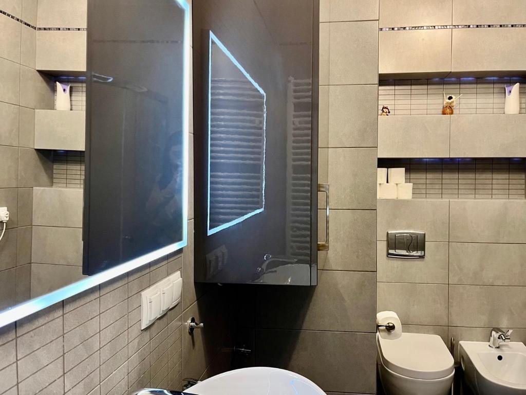 Kúpeľňa v ubytovaní Trevilles Apartamenty Londyn