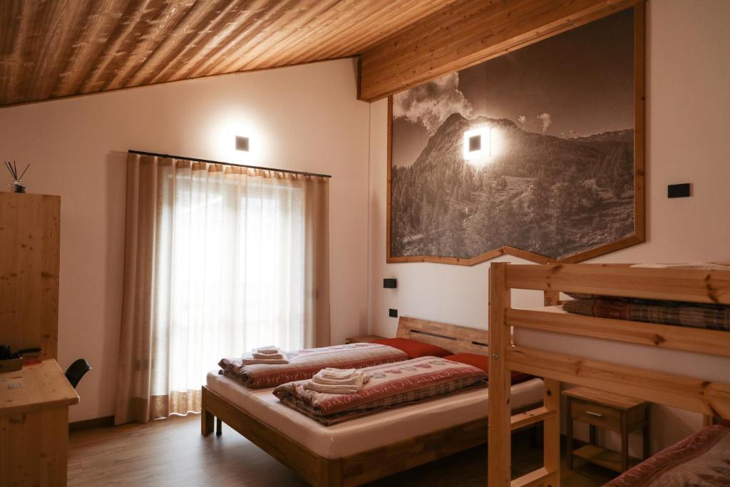 Letto o letti in una camera di Base531