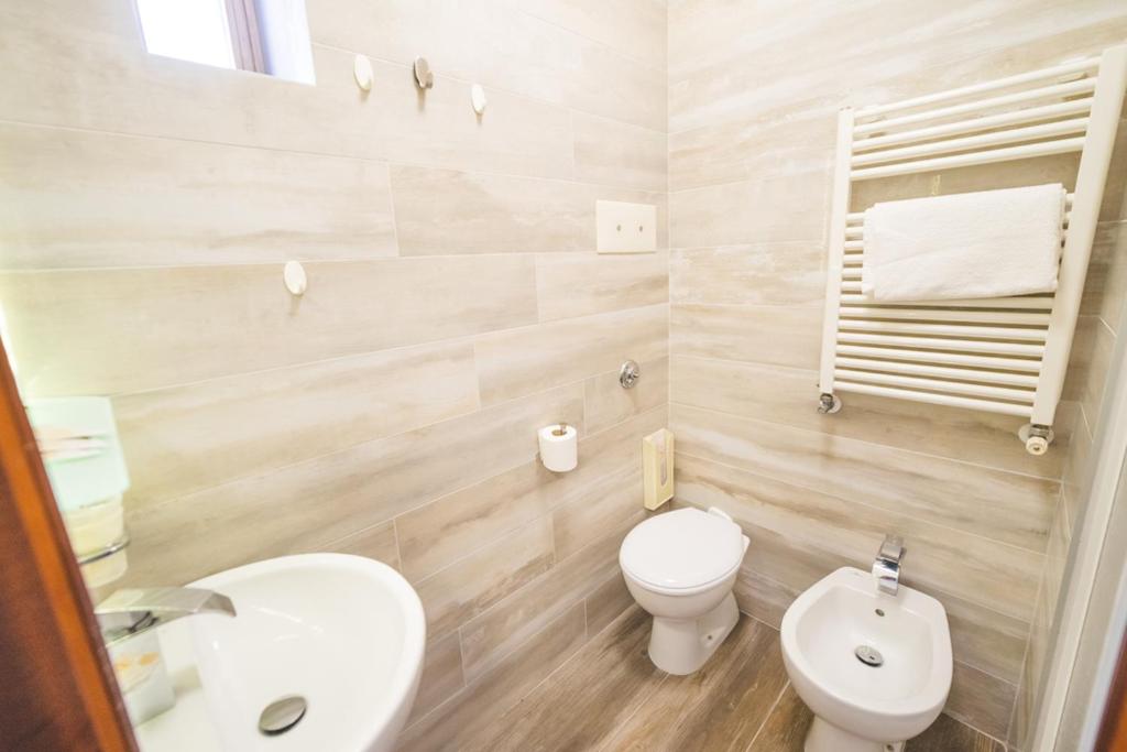 Koupelna v ubytování Hotel Grand Prix