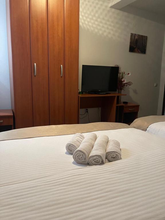 Postel nebo postele na pokoji v ubytování Sobe na Jošanici