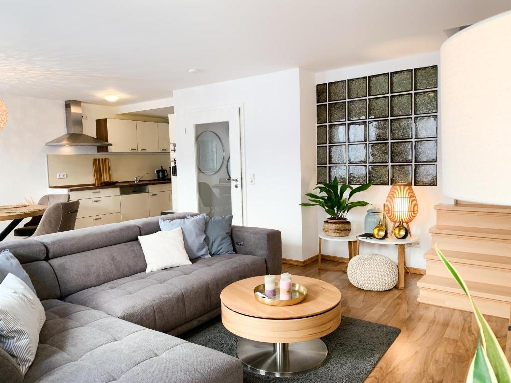 Posezení v ubytování Genuss Cottage - Ferienhaus im Weindorf an der Mosel