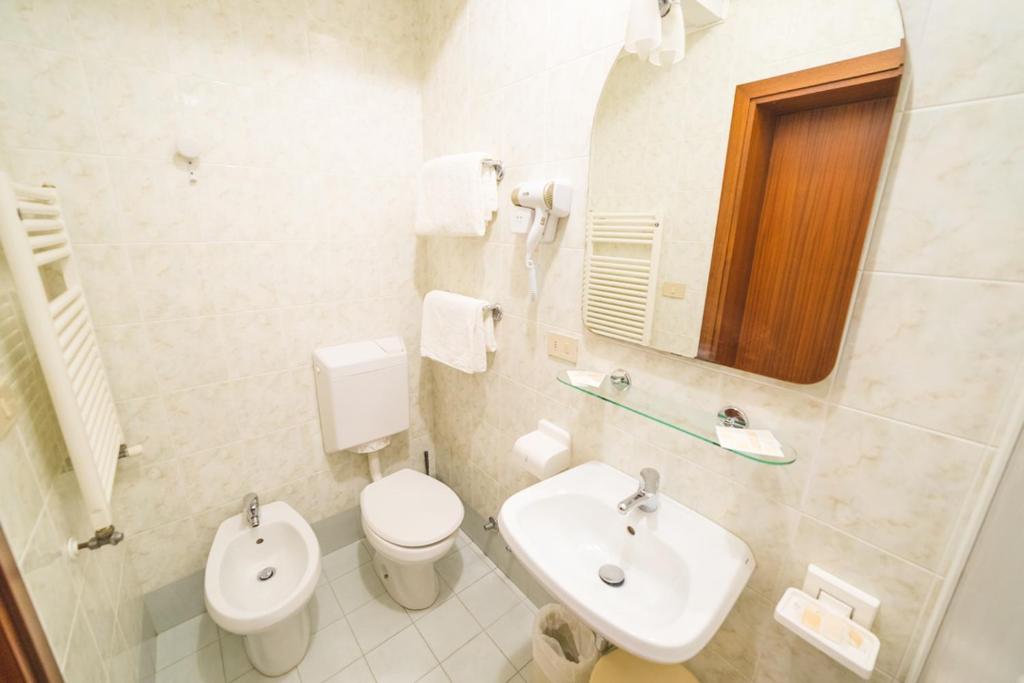 Koupelna v ubytování Hotel Grand Prix