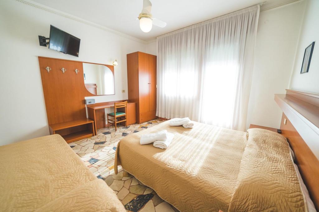 TV a/nebo společenská místnost v ubytování Hotel Grand Prix