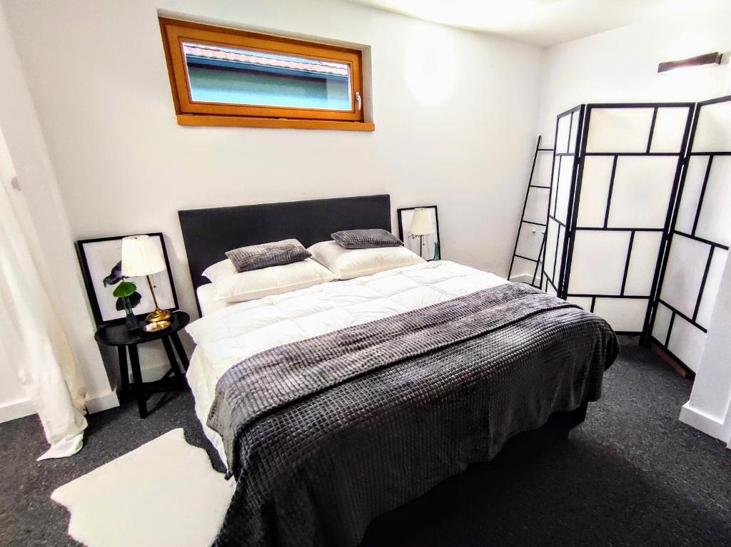 A bed or beds in a room at Park Bôrik 4YOU & Free Parking