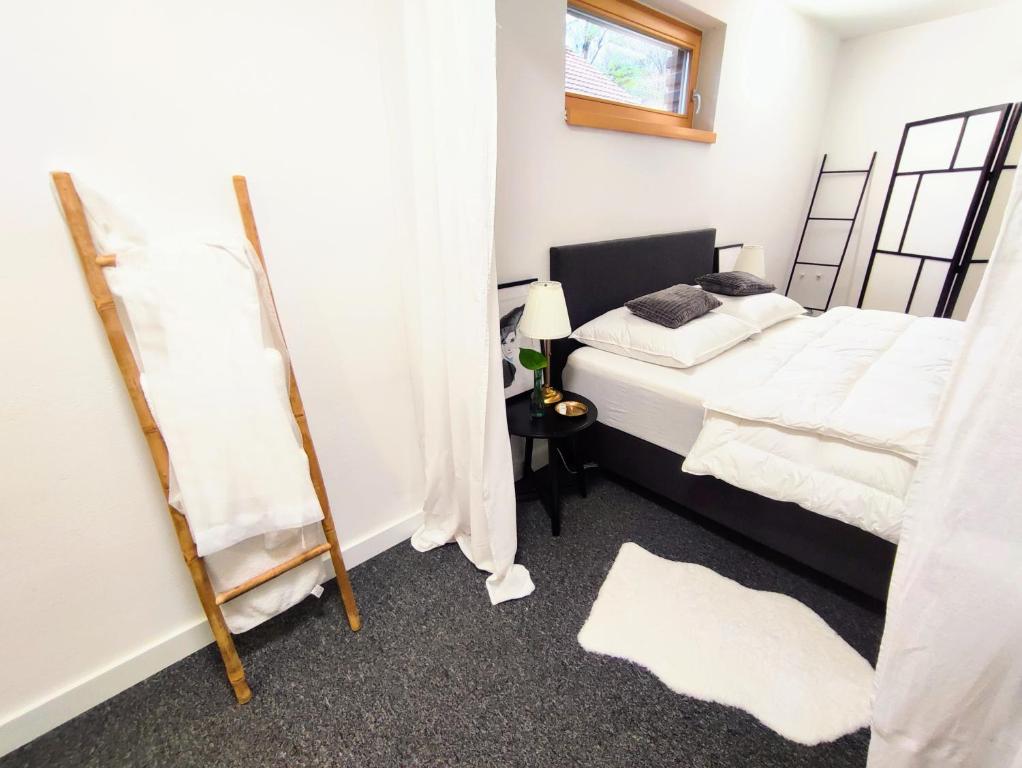 A bed or beds in a room at Park Bôrik 4YOU & Free Parking