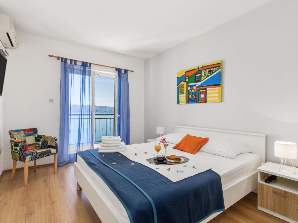Postel nebo postele na pokoji v ubytování Apartment Marina-8 by Interhome