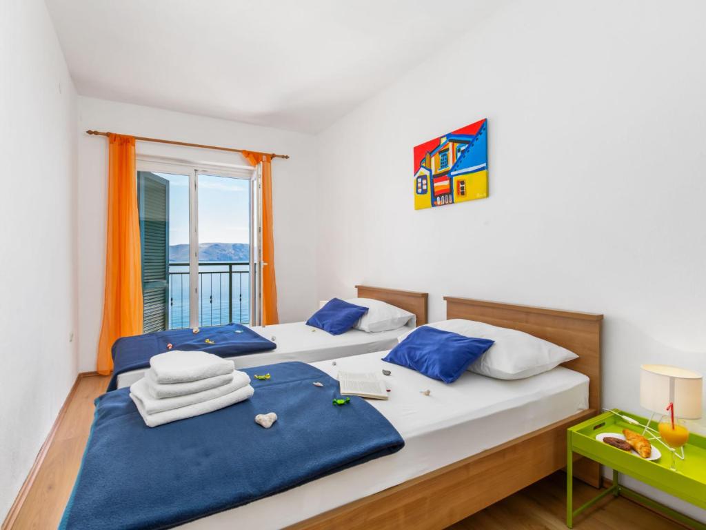 Postel nebo postele na pokoji v ubytování Apartment Marina-8 by Interhome