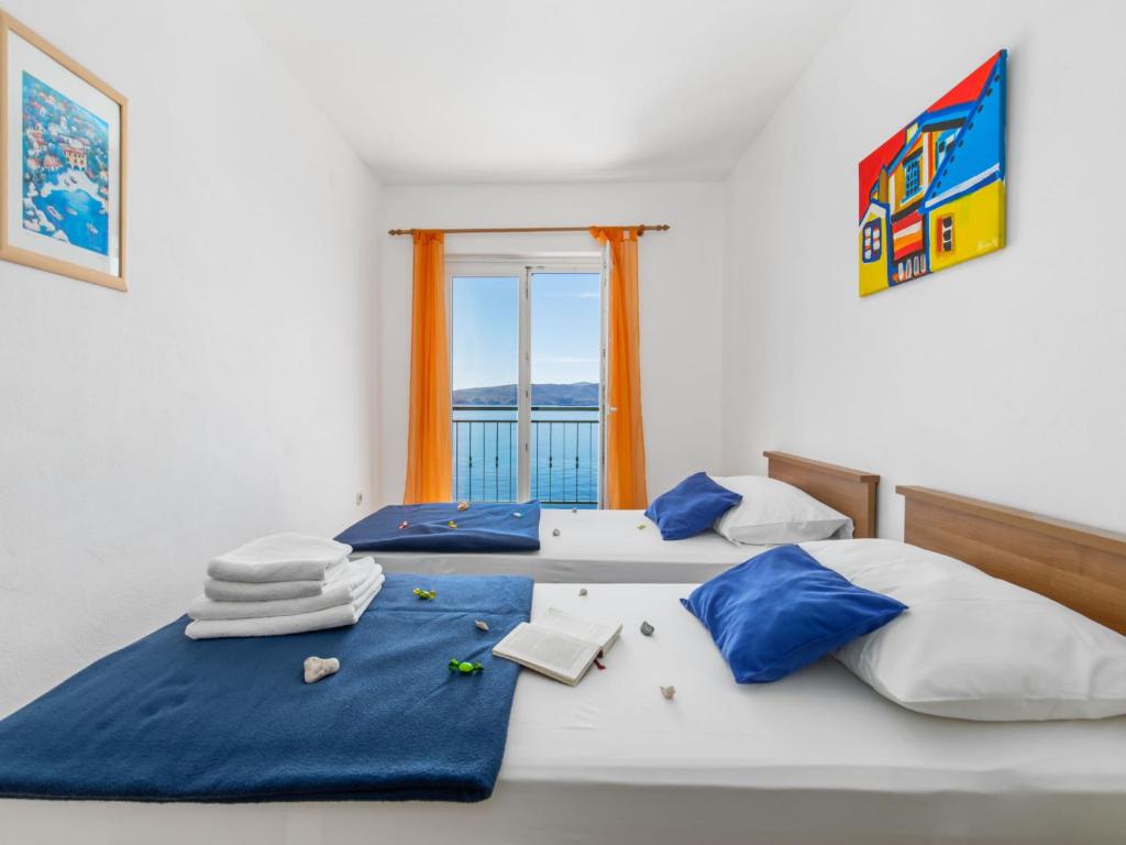 Postel nebo postele na pokoji v ubytování Apartment Marina-8 by Interhome