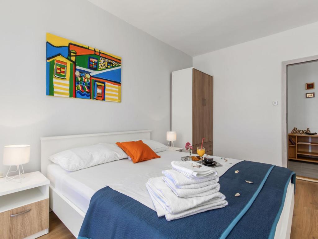 Postel nebo postele na pokoji v ubytování Apartment Marina-8 by Interhome