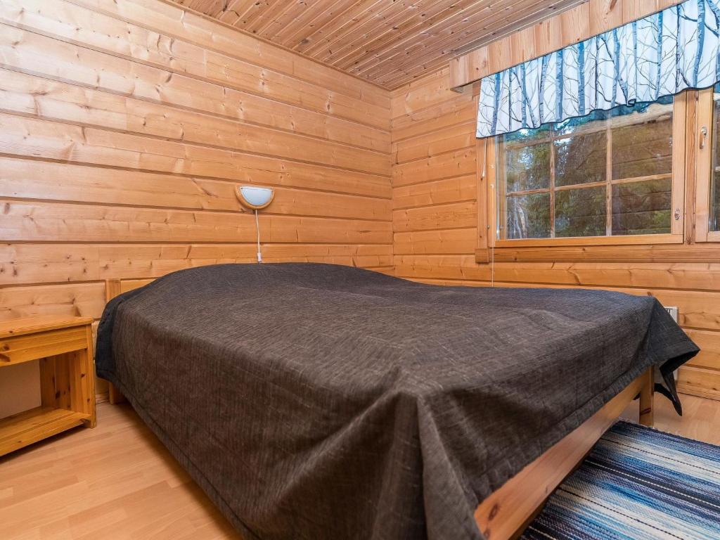 Postel nebo postele na pokoji v ubytování Holiday Home Rukannaava 1a - 2 by Interhome