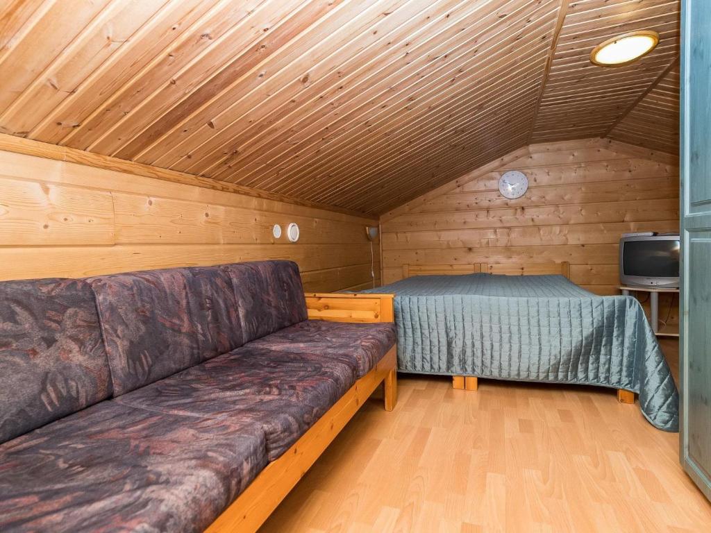 TV a/nebo společenská místnost v ubytování Holiday Home Rukannaava 1a - 2 by Interhome