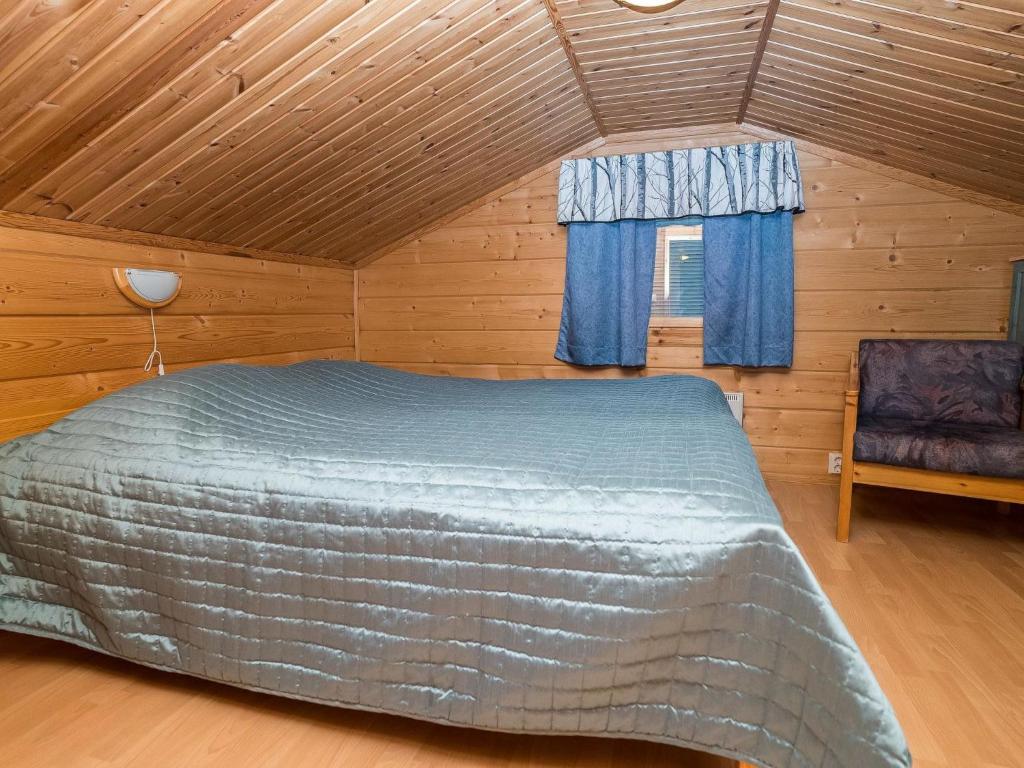 Postel nebo postele na pokoji v ubytování Holiday Home Rukannaava 1a - 2 by Interhome