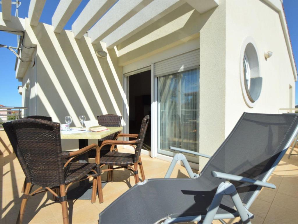 Balkón nebo terasa v ubytování Apartment Sablić-4 by Interhome